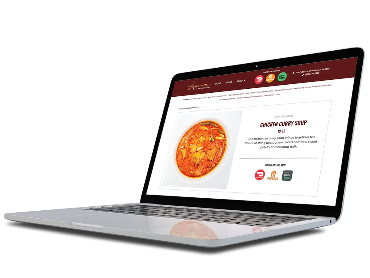 A client website using photography we shot, shown on a laptop